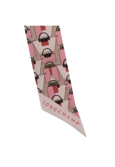 Pink silk scarf with a repeating pattern of illustrated bags and headphones, featuring the brand "LONGCHAMP" in a bold font.