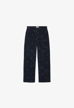 Uske hlače od kordura u mornarskoj plavoj boji s ravnim krojem, ukrašene vezenim okruglim uzorcima. Zatvaranje na dugme i patentni zatvarač sprijeda.