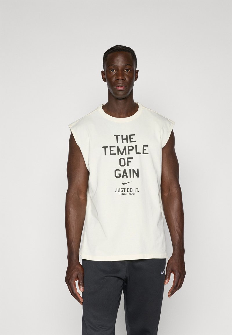 Nike Performance TEE GYM CULTURE - Tricou cu imprimeu - pale ivory