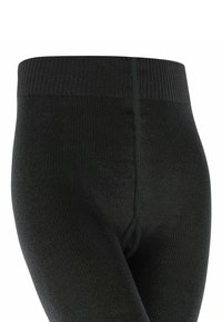 Leggings neri a maglia con una vita a coste, caratterizzati da una texture liscia e dettagli di cucitura verticale sul davanti.
