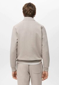 MAGLIONE GIROCOLLO IN CASHSETA MÉLANGE