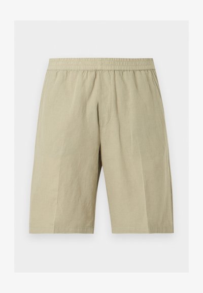 Μπεζ σορτς μήκους μέχρι το γόνατο με ελαστική μέση και πλαϊνές τσέπες, κατασκευασμένα από ελαφρύ ύφασμα.