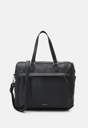 Sac cabas en cuir noir avec doubles poignées, bandoulière détachable, poche zippée à l'avant et logo doré "Anna Field" sur le devant.