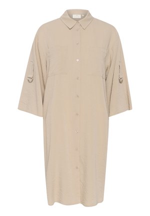 Bež haljina košulja s dugim rukavima od lagane tkanine, koja sadrži ovratnik, dvije prednje džepove i rukave koji se mogu podići s metalnim detaljima.