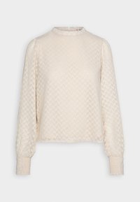 Light beige long-sleeve blouse with a high neck, featuring a textured chevron pattern and smocked cuffs. Made from a soft, lightweight fabric.