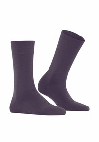 Calzini di cotone viola con una texture liscia, di lunghezza alla caviglia, e rinforzo sul tallone e sulle dita. Design semplice senza motivi o accenti aggiuntivi.