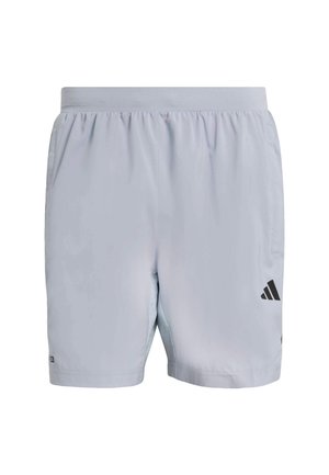 Pantaloncini sportivi grigio chiaro con vita elastica, tasche laterali e logo Adidas nero sul lato inferiore destro. Tessuto liscio.