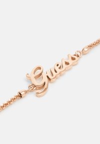 Guess LOGO POWER - Bracelet - rose gold-coloured
