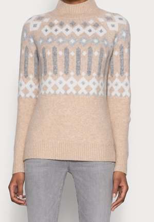 Stickad tröja - beige