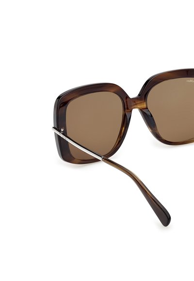 Brown oversized square sunglasses with tortoiseshell frame and metal accents on the temples, shown on a white background.