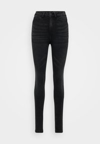 Svarte høyhalsede skinny jeans laget av denim. Har en klassisk fem lomme-design og subtil fading, med en glatt, myk tekstur.