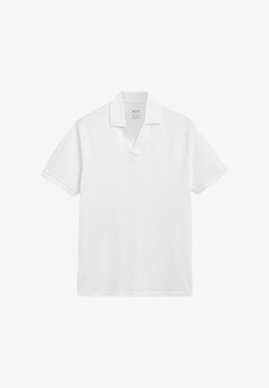 Balta polo krekls ar V veida kaklu, īsām piedurknēm un parasto piegriezumu. Izgatavots no gludas auduma ar minimālistisku noformējumu.