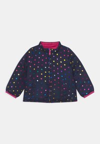 Navy puffer jacket with multicolored polka dots, a pink lining, zip closure, and two side pockets. Features elastic cuffs.