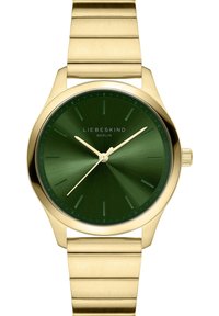 Goldfarbene Armbanduhr mit einem runden grünen Zifferblatt, das eine gebürstete Oberfläche aufweist, goldenen Stundenmarkierungen und einem goldenen Metallarmband mit glatter Oberfläche.