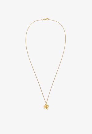 Złoty naszyjnik z łańcuszka z teksturowanym wisiorkiem w kształcie kwiatu. Łańcuszek jest cienki i elastyczny, idealnie dopełniając floralny wzór.