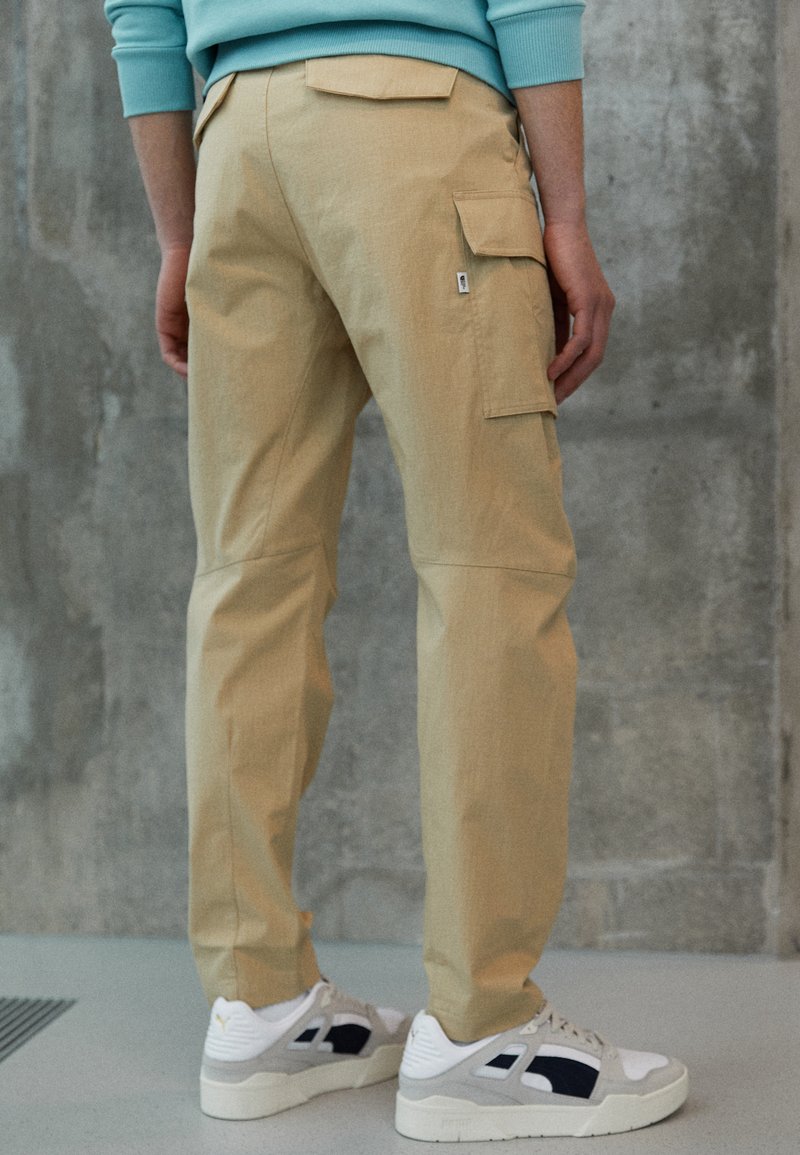 The North Face ANTICLINE PANT Pantalon cargo khaki stone/beige