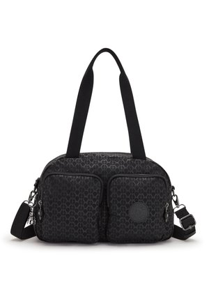 Black patterned shoulder bag featuring two zippered front pockets and a circular logo accent. Includes thick straps for easy carrying.
