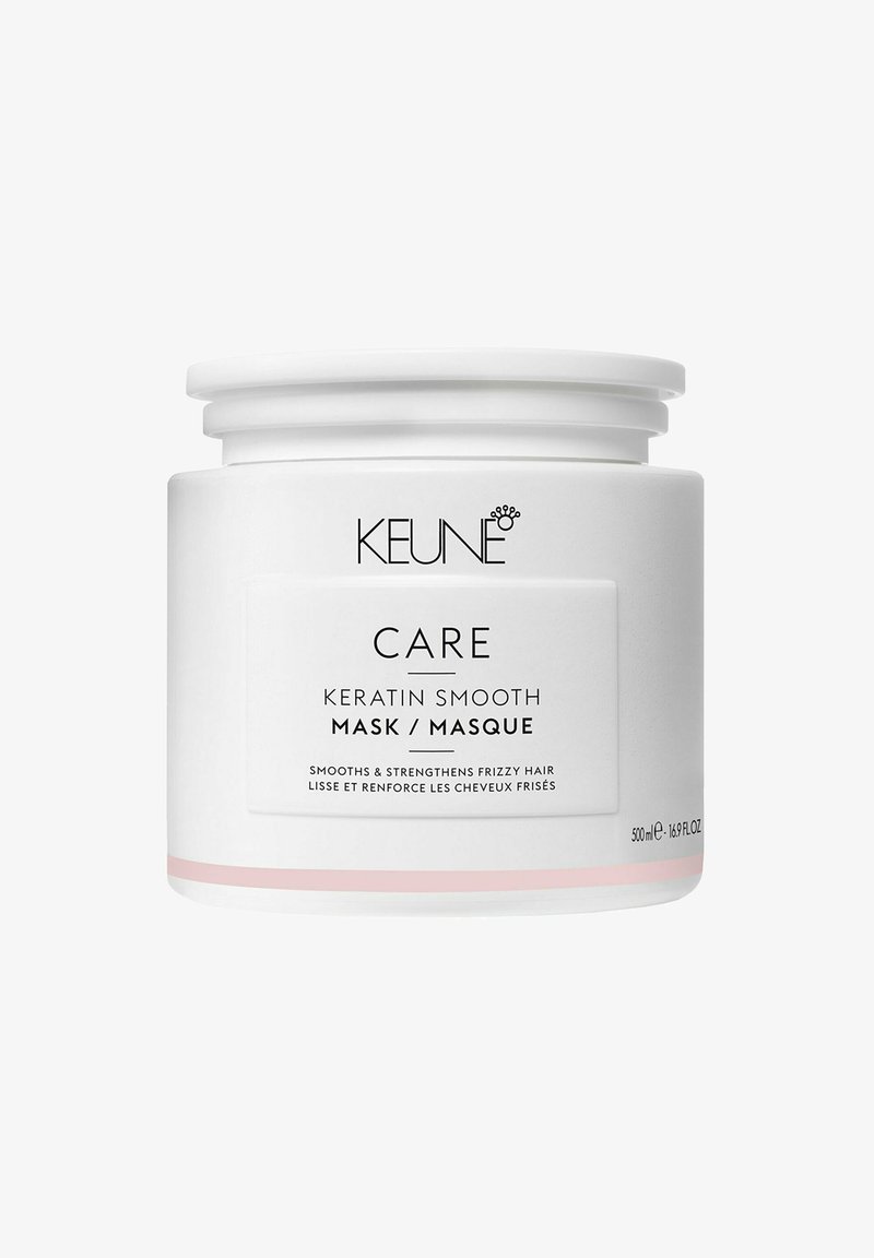 Maschera Keratin Smooth di Keune Care in un contenitore bianco con accenti rosa. Il barattolo contiene 500 ml e presenta un'etichetta con testo chiaro che indica il prodotto.