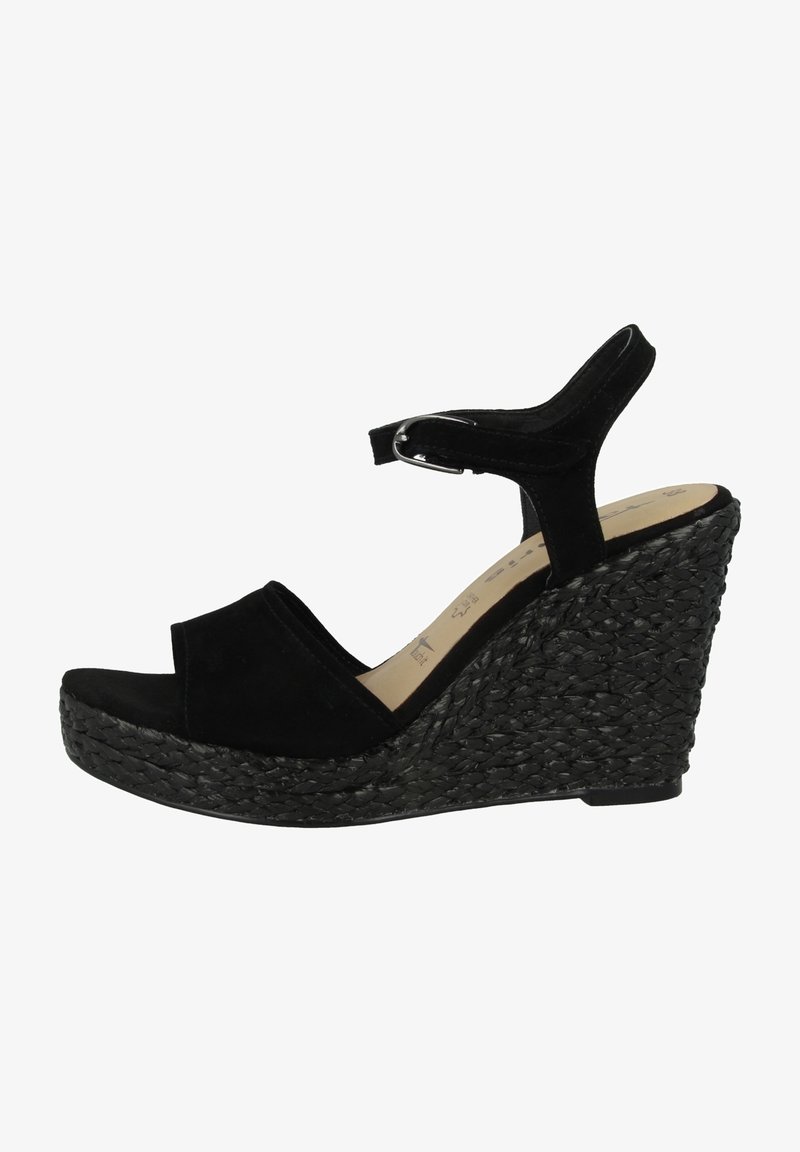 Sandale compensée noire avec semelle plateforme tressée, bout ouvert et bride cheville avec boucle argentée.