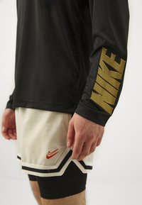 Nike Performance TEE  - Pikkade varrukatega topp - black