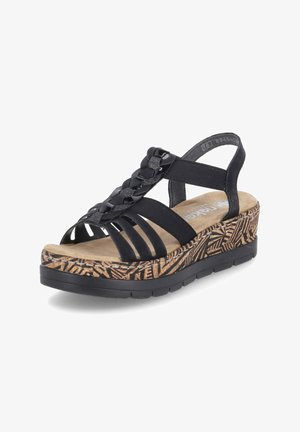 Zwarte wedge-sandalen met elastische bandjes, geweven details en een platform met kurkpatroon. Zachte voetbed en zwarte rubberen zool.