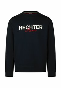 Dunkelblaues Sweatshirt mit rundem Halsausschnitt, langen Ärmeln und gerippten Bündchen. Mit den weißen und roten Buchstaben "HECHTER Paris" über der Brust.