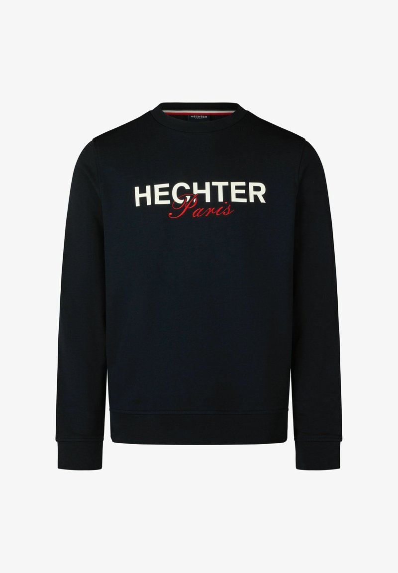 Dunkelblaues Sweatshirt mit rundem Halsausschnitt, langen Ärmeln und gerippten Bündchen. Mit den weißen und roten Buchstaben "HECHTER Paris" über der Brust.