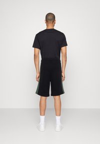 Lacoste COLOR BLOCK - Pantalon de survêtement - abysm sequoia