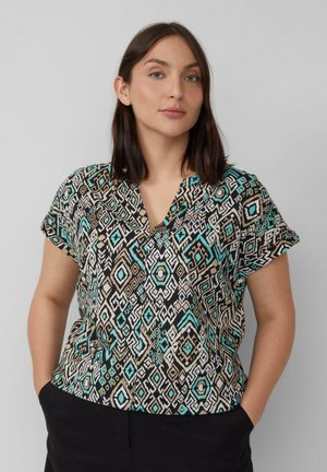 Korte mouwen blouse in een geometrisch patroon met zwart, beige, turquoise en wit. V-hals ontwerp, lichte stof en een relaxte pasvorm.