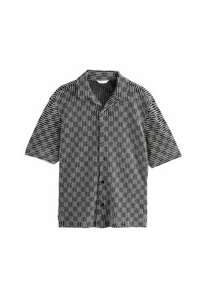 Short-sleeve shirt in black and white, featuring a wavy pattern, button closure, and a notched collar. Made from lightweight fabric.