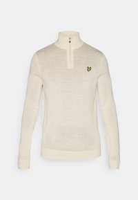 Cream-colored zip-up sweater with long sleeves, made from a soft material. Features a small yellow logo on the chest and ribbed cuffs.