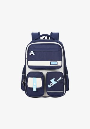 Zaino blu navy con una striscia beige a contrasto, numerosi zip, due tasche frontali e un accento riflettente. Realizzato in tessuto resistente.