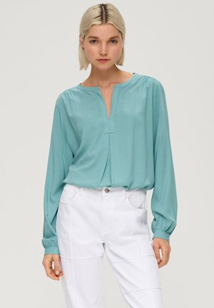 MIT AUSSCHNITT - Tunika