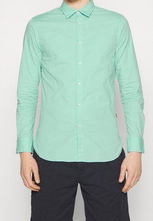 Mint green long-sleeve shirt with a button-down collar, featuring a slim fit design, front buttons, and cuffed sleeves.