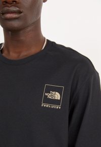 The North Face COORDINATES TEE - Print T-shirt - black