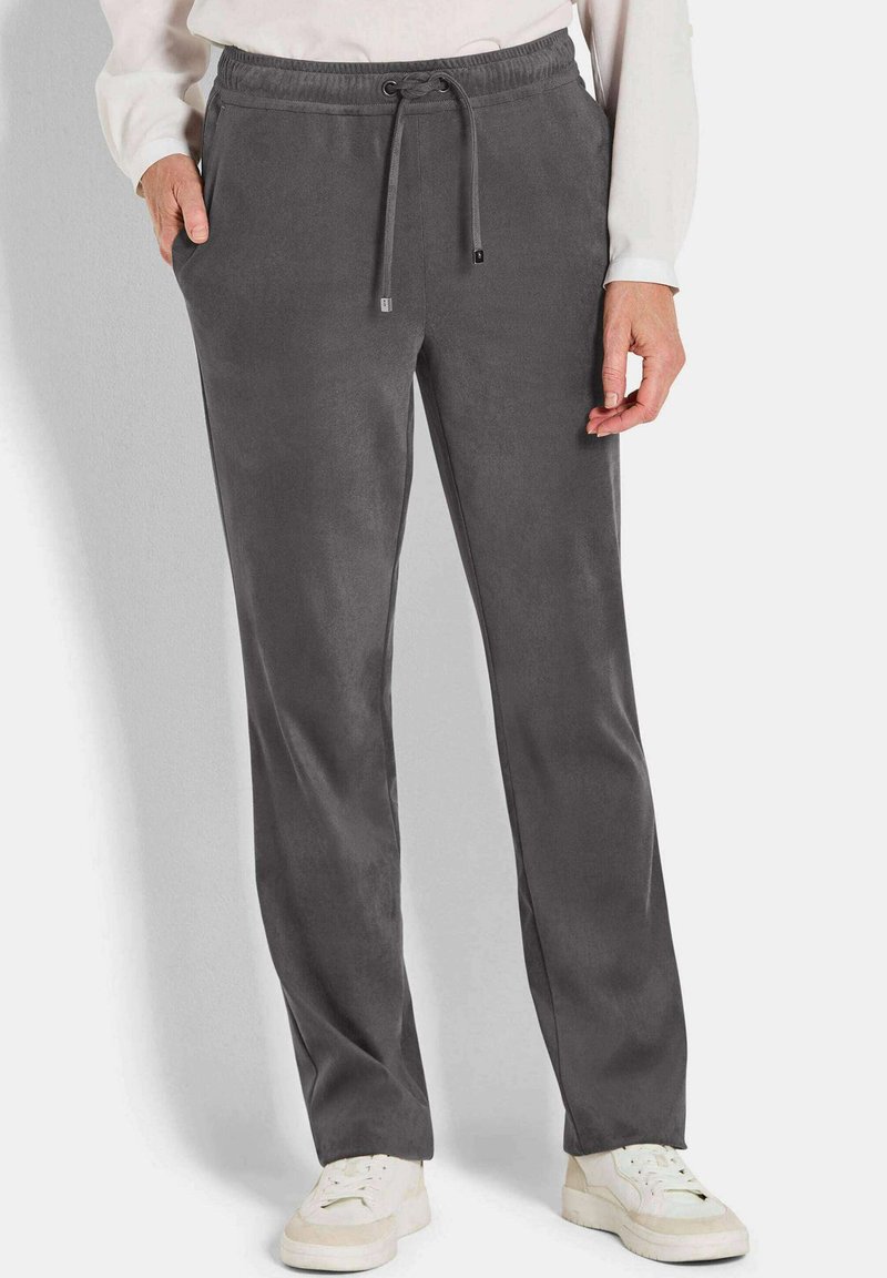 Grijze sweatpants van zacht materiaal, met een elastische tailleband met een trekkoord, zijzakken en een relaxed fit.