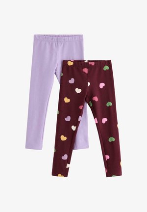 Zwei Paar Kinderleggings, eines einfarbig lavendel und eines bordeaux mit mehrfarbigen Herzmustern.