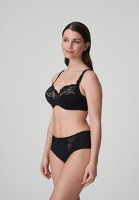 Black lingerie set featuring a lace bra with a structured design and matching panties. Both pieces display a gingham pattern with lace accents.