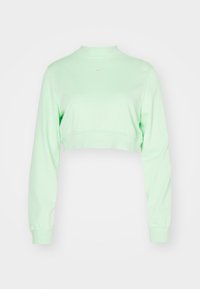 Ljusgrön långärmad kort sweatshirt med en liten vit Nike-logotyp centrerad vid halsringningen.