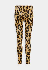 Leopardprint leggings med en beige bund og sorte pletter, elastisk talje og en glat tekstur. Designet til en tætsiddende silhuet.