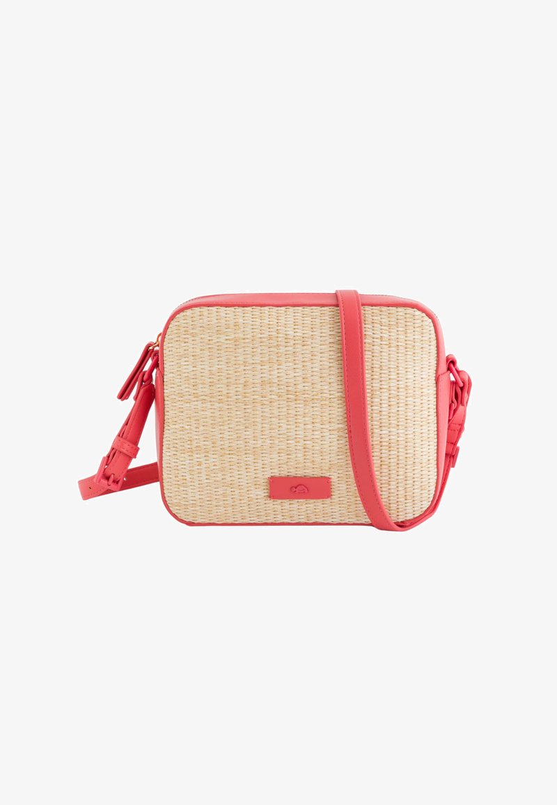 Rectangular crossbody bag featuring a woven straw body, coral synthetic leather accents, and an adjustable strap. Small logo plate on front.