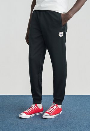 - Spodnie treningowe