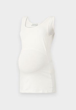 Bijela majica za trudnice s izrezom na vratu, bez rukava i uskim krojem koji ističe zaobljeni oblik trbuha. Mekana tekstura tkanine.