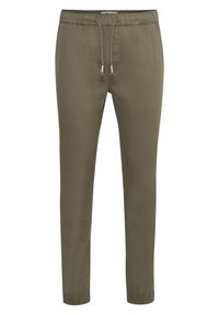 Olijfgroene, taps toelopende broek gemaakt van zachte katoenstof. Heeft een elastische tailleband met trekkoord en elastische boorden bij de enkels.
