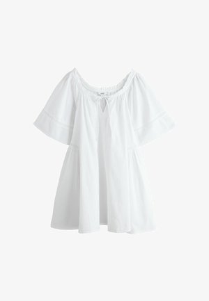 Balts plecus atsegts tops ar uzplašņotām piedurknēm, elastīgu apkakli un mezglsīkola detaļu priekšpusē. Izgatavots no viegla auduma ar reljefām akcentēm.