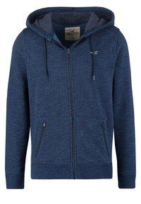 Marinblå zip-up hoodie gjord av strukturerat tyg, med dubbla sidofickor, dragsko och fodrad huva. Logotyp på bröstet.