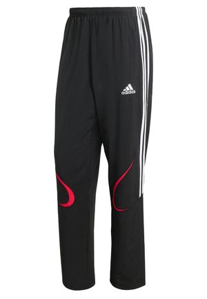 Mustad mustrina kohandatud mustad retuusid punaste aktsentidega ja valgete külgribadega. Omavad elastset vöökohta ja siledaid, kergekaalulisi materjale.