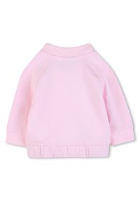 Ροζ φούτερ με ριμπ γιακά και μανσέτες, με σούρα στο τελείωμα στη μέση και μανίκια ράγκλαν για άνετη εφαρμογή.