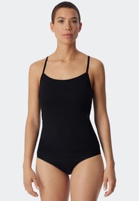 Zwarte top met dunne bandjes, een gladde textuur, aansluitend ontwerp en een ronde halslijn, aangevuld met bijpassend ondergoed.