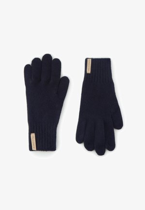 Mörkblå stickade handskar i mjukt material, med ribbstickade mudd och en liten läderetikett på handleden med inskriptionen "FALCONERI".